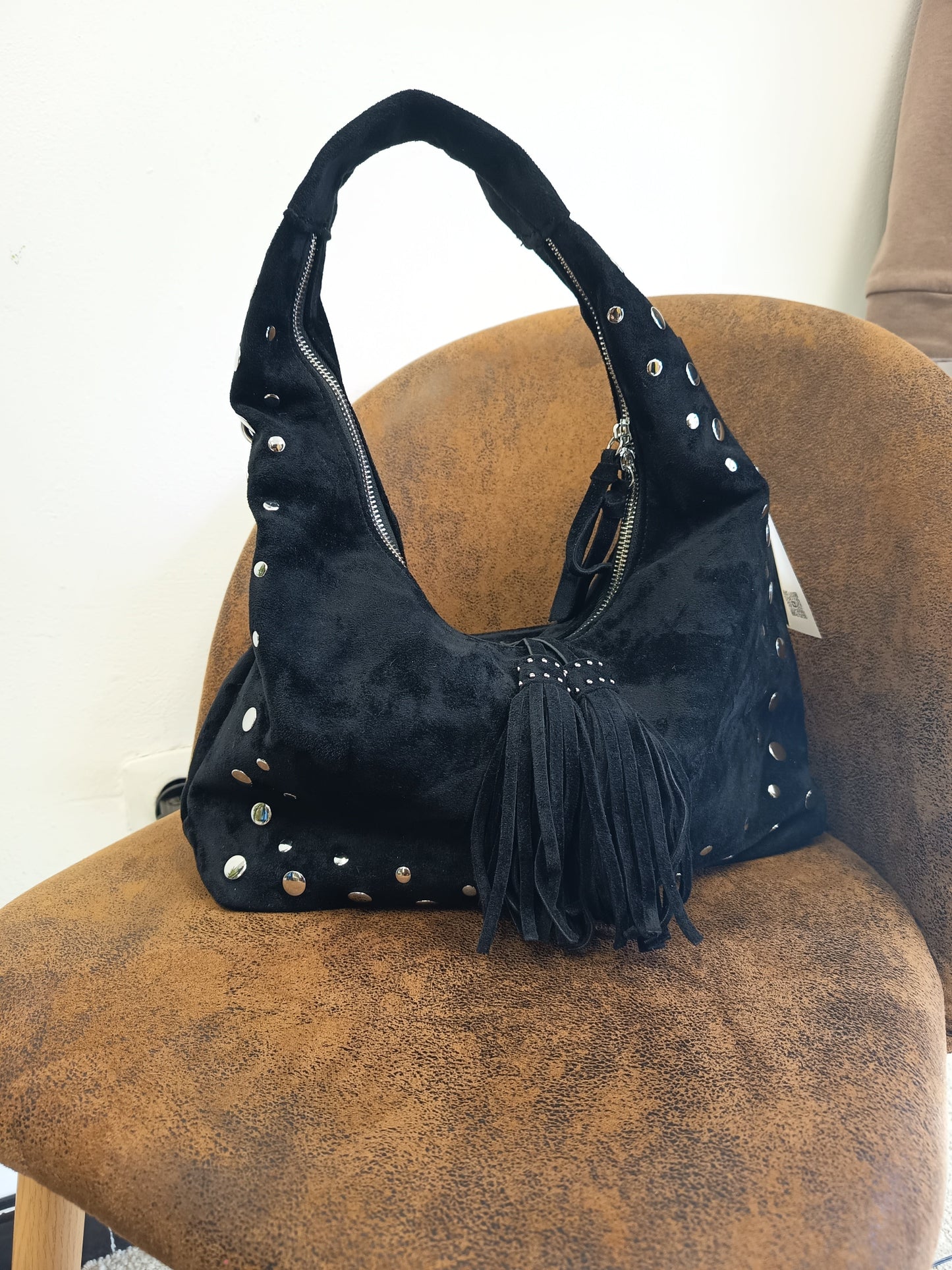 Bolso tachuelas ante